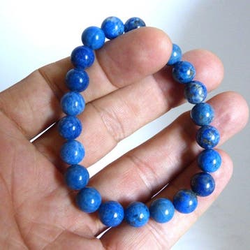 Prachtige collectie armbanden van lapis lazuli, tijgeroog,