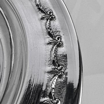 Onderzetter - lint- en strikslinger - .950 zilver -