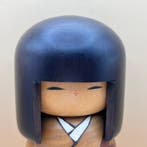 Twee vintage kokeshis, gesigneerd door Usaburo & Hajime