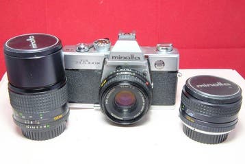 Minolta SRT 100 X + Rokkor obiettivi: 2/45mm + 2.8/135mm +, Audio, Tv en Foto, Nieuw