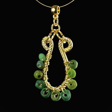 Oud-Romeins Pendant, met draadgewonden Romeinse groene