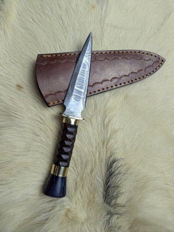 Handcrafted Damascus Hunting Knife with Sculpted Ebony Wood