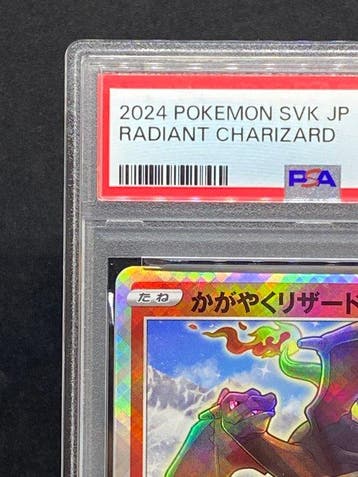 Pokémon - 1 Graded card - Radiant Charizard #001/044 Foil -
