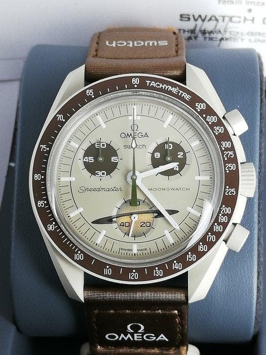 Swatch - MoonSwatch - Mission to Saturn - Sans prix de, Handtassen en Accessoires, Horloges | Heren