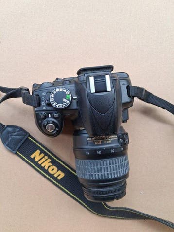 Nikon D3100 + AF-S 18-55mm F3.5-5.6GII ED Appareil photo, Audio, Tv en Foto, Nieuw
