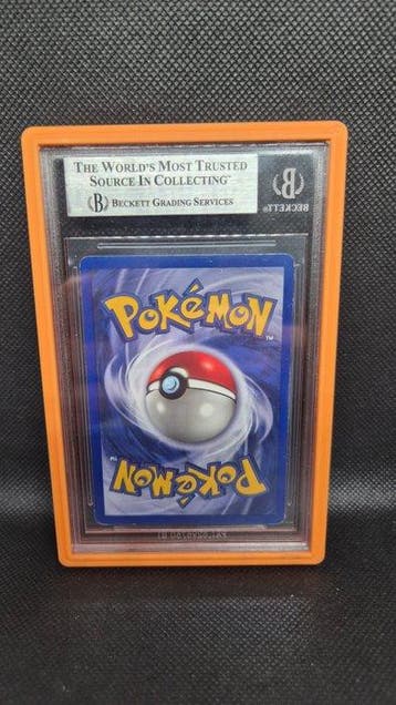Pokémon - 1 Graded card - Charizard, Base set 4 First, Nieuw