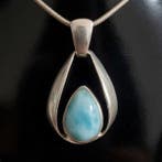 Larimar. Set van hanger en oorbellen met beveiligde