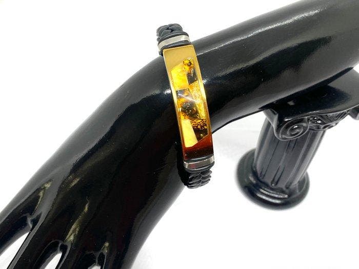 Gouden Horizon: Baltisch amber en gevlochten leren armband -, Antiek en Kunst, Curiosa en Brocante