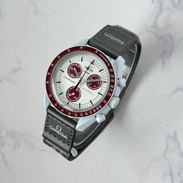 Omega x Swatch - MoonSwatch - Mission to Pluto - Sans prix, Handtassen en Accessoires, Horloges | Heren, Nieuw