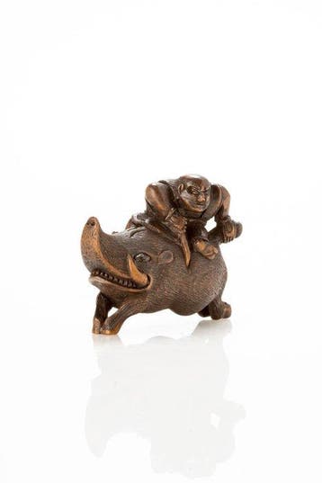 Een zeer ongebruikelijke netsuke van Nitta no Shiro die een