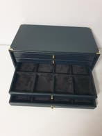 Accessoires. Black eco-leather coin cabinet for 32 places