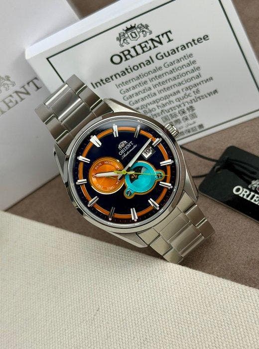 Orient - Stretto Sun & Moon Automatic Day/Date Special, Handtassen en Accessoires, Horloges | Heren