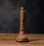 Oud-Romeins glas gewikkeld in textiel met Spaanse