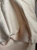 Geometrische jacquard in ivoor en roomroze - tijdloze klasse