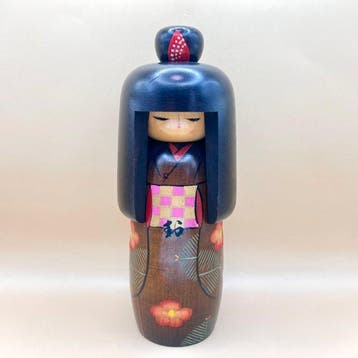 Prijswinnende kunstenaar Tanaka Kojo Kokeshi-pop, Travel