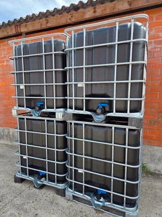 Nieuwe Zwarte ibc containers van 1065 L ( Tonnen,Vaten ), Ophalen, Kunststof, Met kraantje, 150 liter of meer