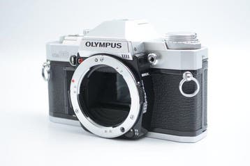 Olympus OM-30 + F.Zuiko Auto-S 1.8/50mm Single lens reflex
