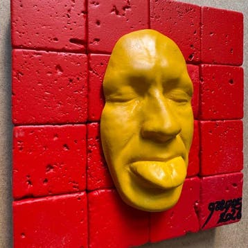 gregos - Yellow mockery on red bricks