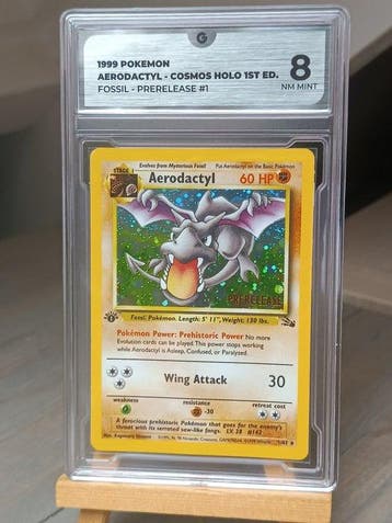 Pokémon - 1 Graded card - Aerodactyl Première édition - GG 8, Hobby & Loisirs créatifs