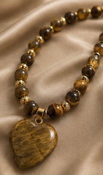 Elegante tijgeroog-ketting met hartvormige hanger -