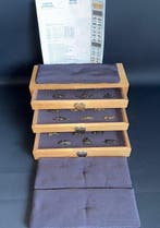 9 pairs of menuki in collection cabinet - Japan - Edo period