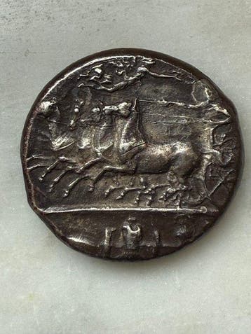 Replica van een oude Griek Zilver munten van Syracusae in