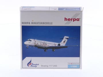 Schaal 1:500 Herpa 510110 Boeing 717-200 Bangkok Air Ang..., Ophalen of Verzenden, Zo goed als nieuw