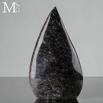 Vulkanisch obsidiaans glas met een sprankelende zilveren