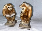 Figurine - Span boekensteunen (2) - Poterie