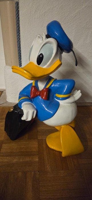 Walt Disney - Donald Duck Figure leaning on his suitcase /, Collections