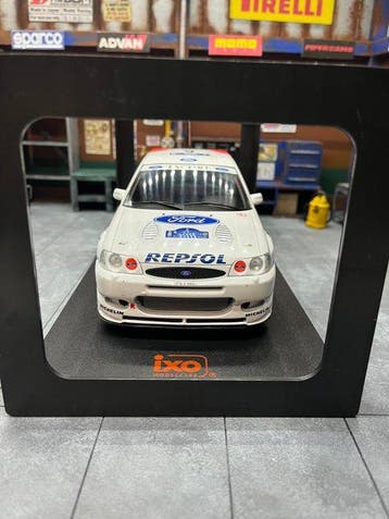 IXO 1:18 - Modelauto - Escort WRC, Akropolis, 1997, #6, 1:18, Nieuw