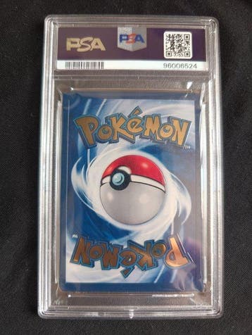 Pokémon - 1 Graded card - Charizard 4/102 Foil, Limited