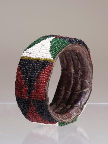 Kralenarmband van leer met manchetstijl, type Orun Ileke –