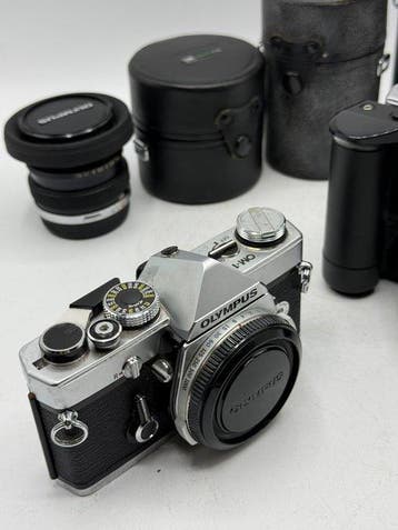 Olympus OM-1 / OM-2 + 28mm + 50mm + 135mm + 75-150mm |