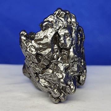 Météorite en fer authentique. Forme sculpturale. CAMPO DEL
