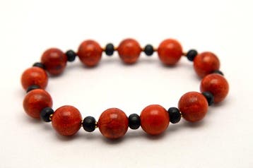 Koraal - Fijn rode koraal ronde kralen 10 mm armband -
