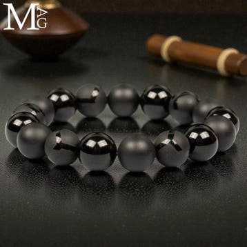 Elastische zwarte onyx armband – ontwerp met drie