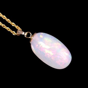 Grand pendentif en opale éthiopienne de 10,1 ct affichant