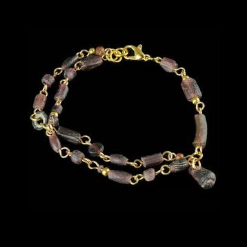Oud-Romeins Bracelet, met draadgewikkelde paarse glazen