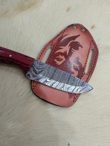 Traditional Damascus Steel Knife with Decorative Leather