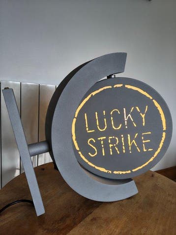 Enseigne lumineuse tournante Lucky Strike - Enseigne