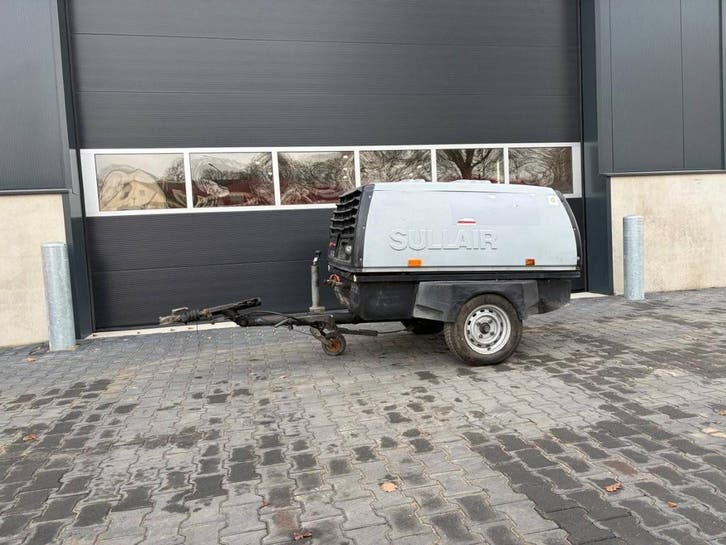 Veiling: Compressor Sullair 65K Diesel 2004, Articles professionnels, Machines & Construction | Pompes & Compresseurs, Enlèvement
