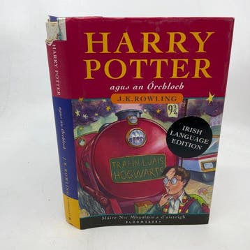 J.K. Rowling - Harry Potter Agus An Orchloch (first Irish