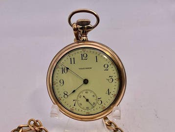 Waltham Traveler . Laminato oro . 1900 . Con catena . -