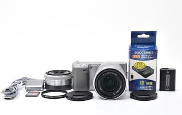 Sony a NEX-5 + E 3.5-5.6/18-55mm OSS + E 2.8/16mm Language