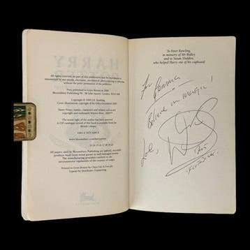 J.K. Rowling / and inscribed by actor Warwick Davis - Harry
