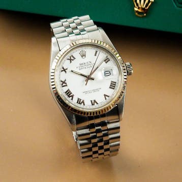 Rolex - Datejust 36 18k White Gold Fluted Bezel White Roman
