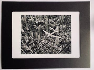 Margaret Bourke-White - A DC-4 Flying over New York City,