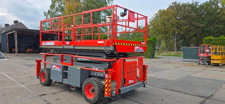 SkyJack SJ 9241 RT schaarhoogwerker diesel 9241 14m, Zakelijke goederen, Machines en Bouw | Liften, Steigers en Ladders, Ophalen