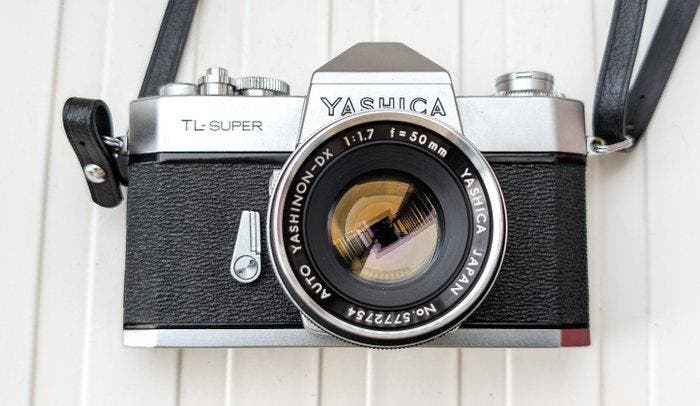 Yashica TL Super + Yashinon-DX 1,7/50 Single lens reflex, Audio, Tv en Foto, Fotocamera's Analoog